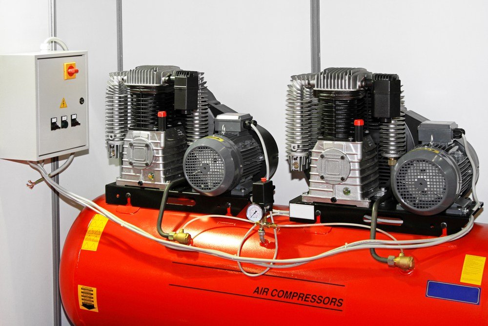 rare double air compressor with two separate compressors feeding into a single tank